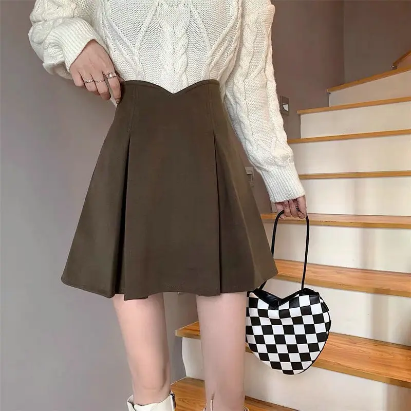 Girl A-line Skirt Autumn And Winter 2022 New Solid Women's High Waist Design Small Black Woolen Temperament Pleated Short Skirt