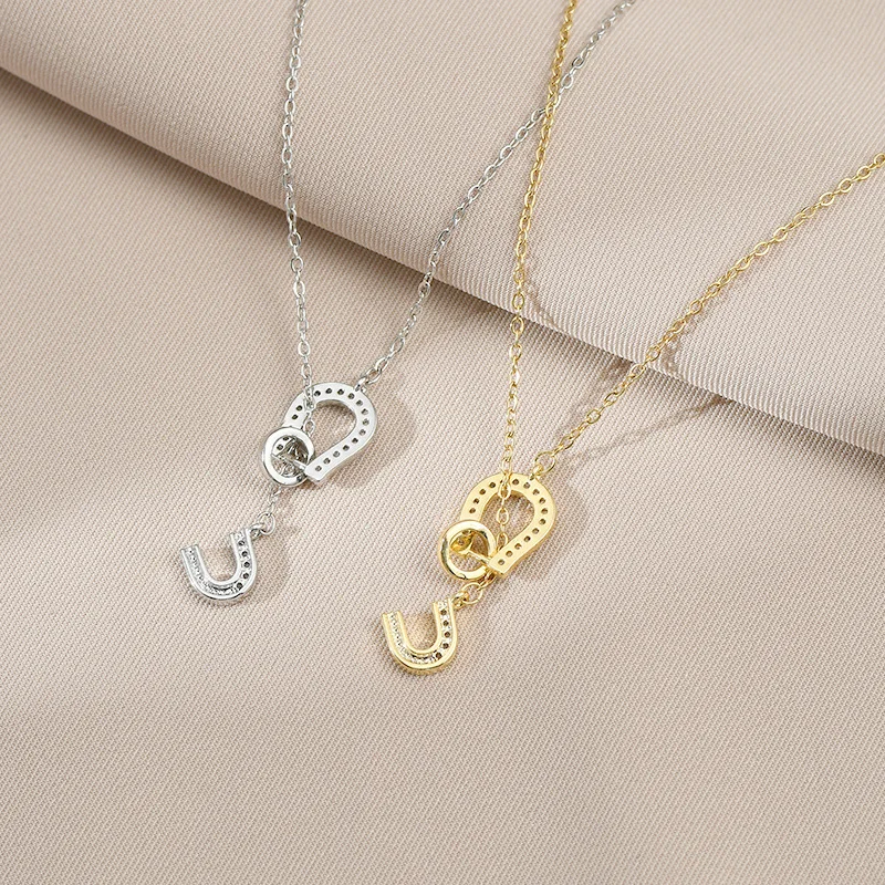 

Electroplated micro-inlaid temperament clavicle chain niche design sense horseshoe pendant necklace all-matching sweater chain