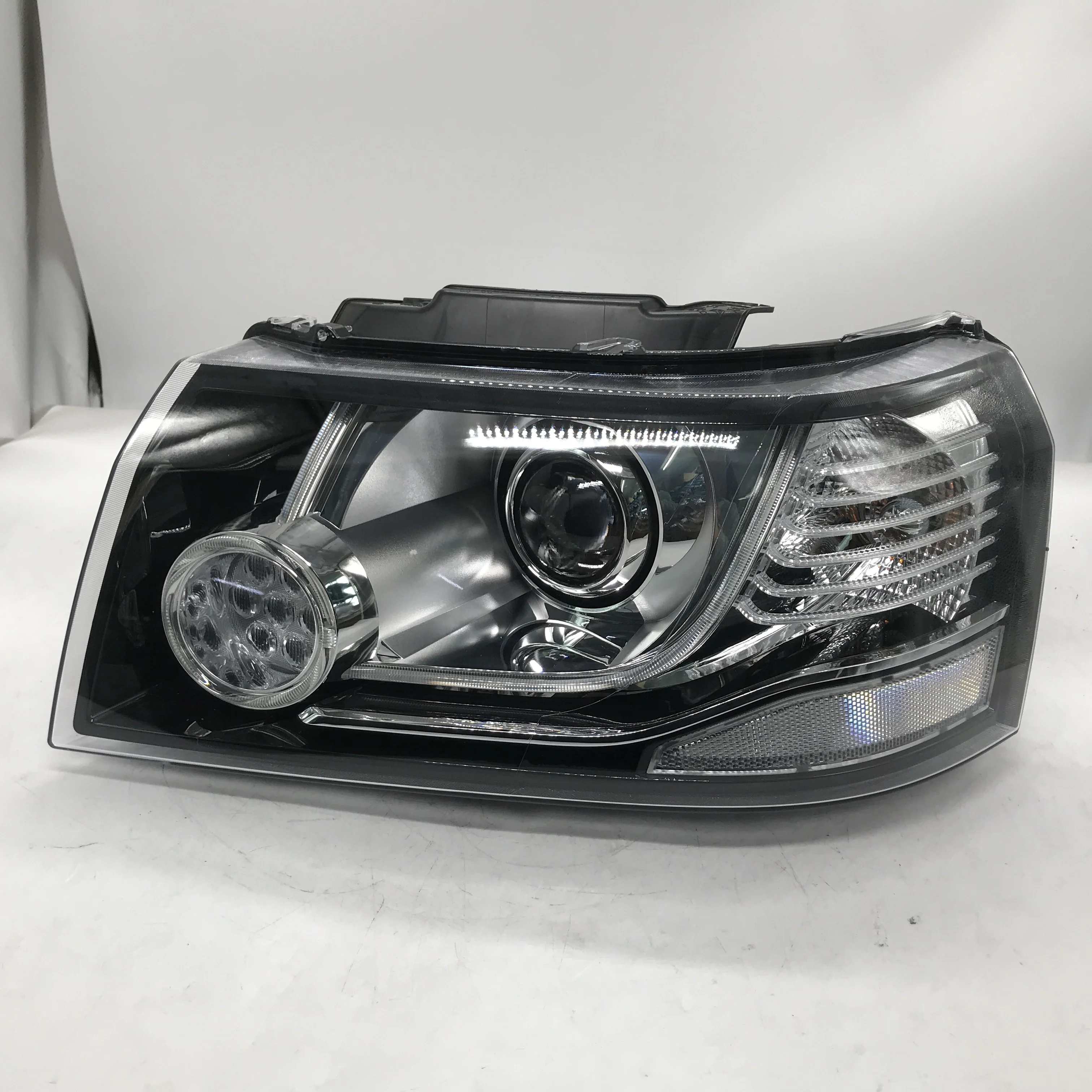 

Применимо к открытию фар Freelander II