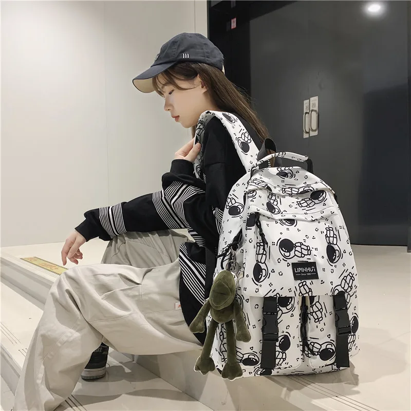 

Qyahlybz astronaut cartoon cartoon backpack male senior high school college school bags female large capacity backpack