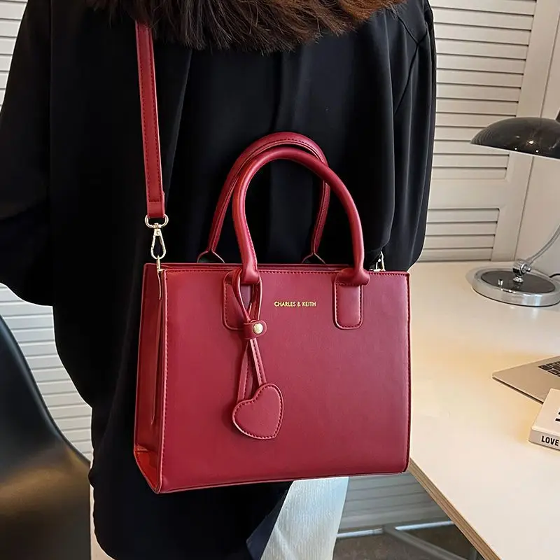 

Celebrity 2023 white-collar high-end sense diagonal women's bag, Korean bridesmaid bag, hand-held red wedding bridal bag ins