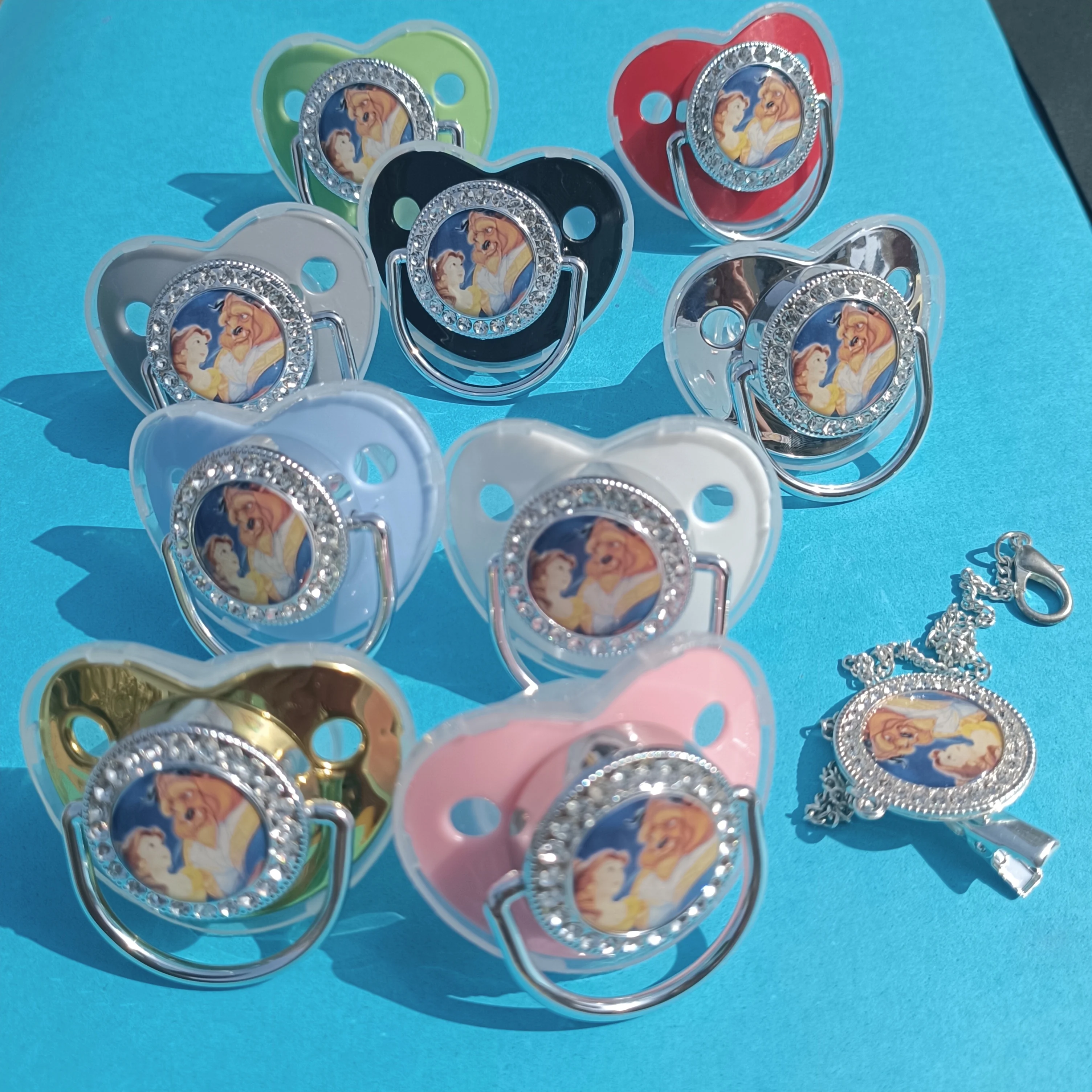 

[1set] Movie Beauty & The Beast Printed Sparkly Rhinestone Pink Bling Pacifiers for Babies Bling Speenkoord chupetes para bebes