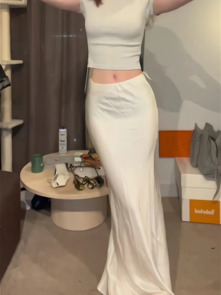 Популярная в этом году модная темпераментная утягивающая юбка с высокой талией