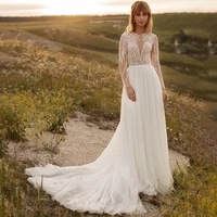 elegant a line o neck wedding dress 2022 sexy long sleeve lace appliques bridal gown illusion tulle pearls button sweep train