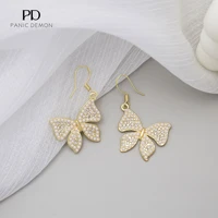 japan and south koreas new pearl butterfly womens earrings are simple and elegant with long tassels and asymmetrical earrings