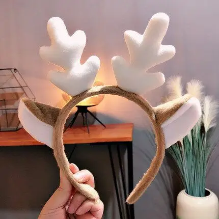 

Рождественский плюшевый обруч с оленем