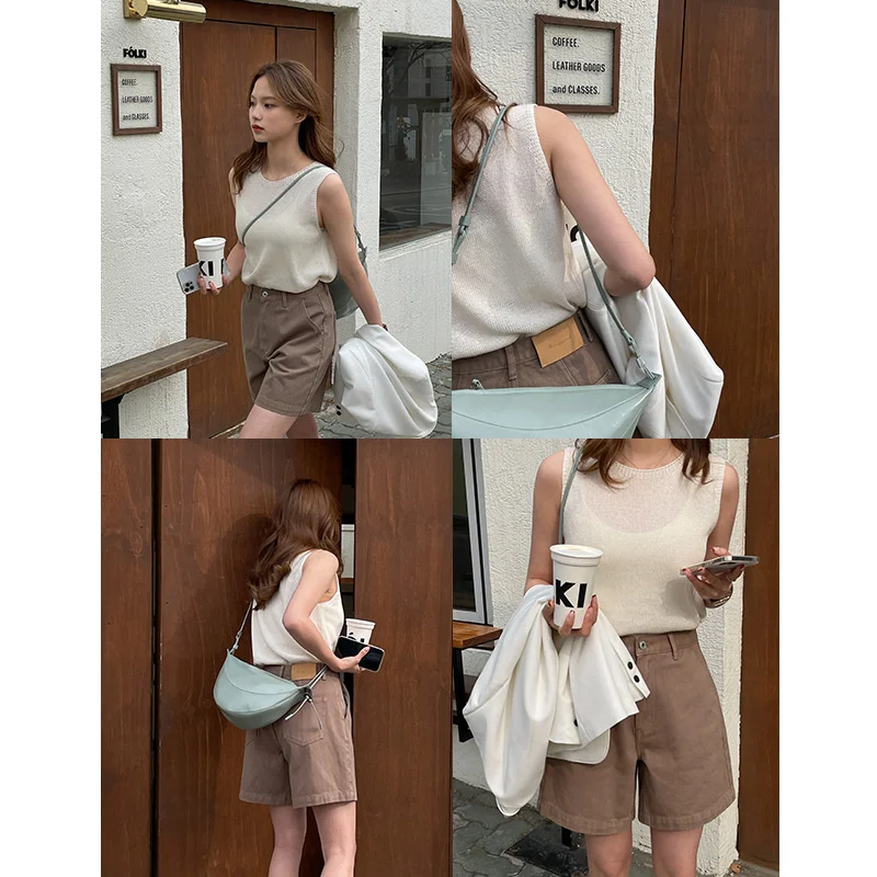 Женский трикотажный жилет с круглым вырезом весна 2022 |