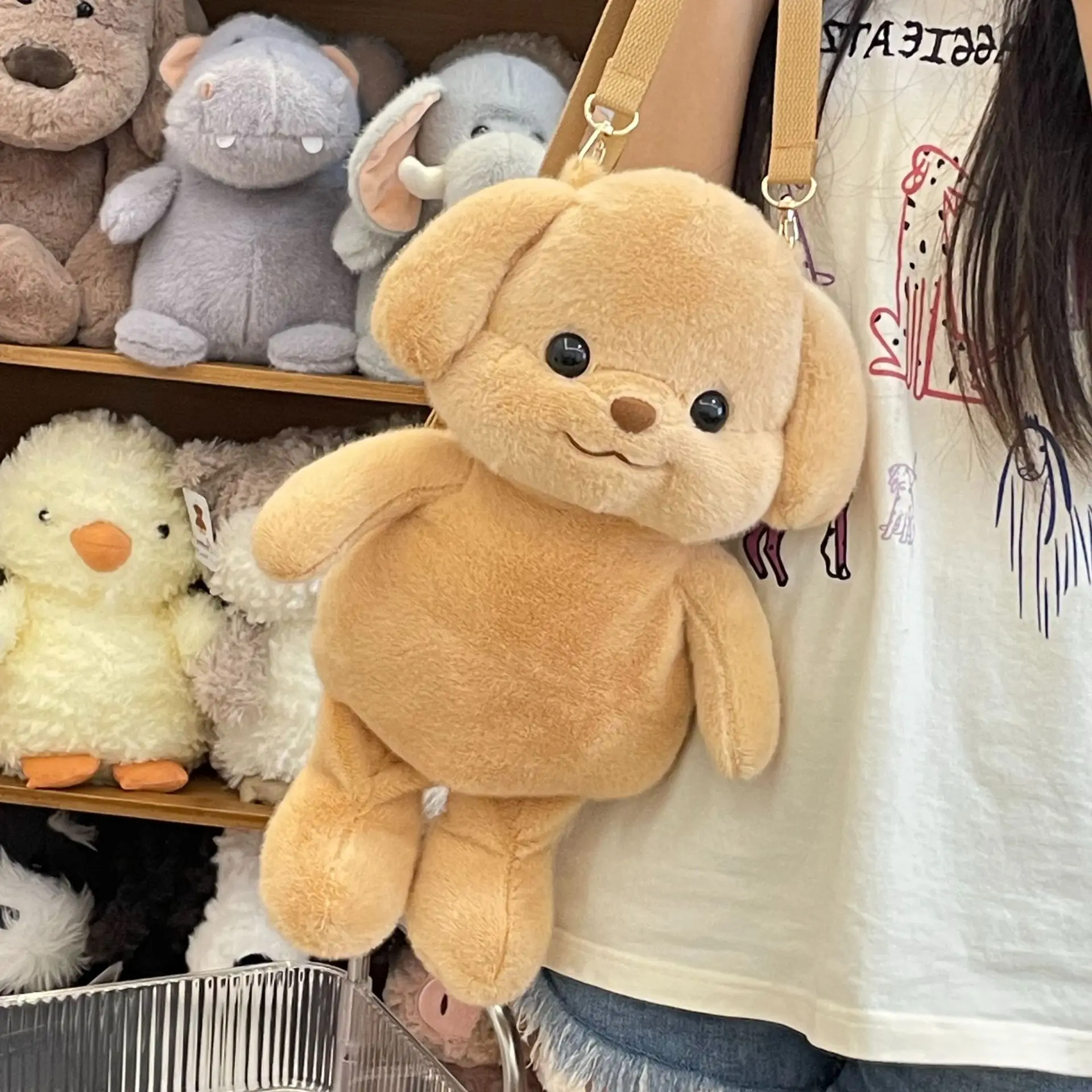 Плюшевая игрушка в виде пуделя