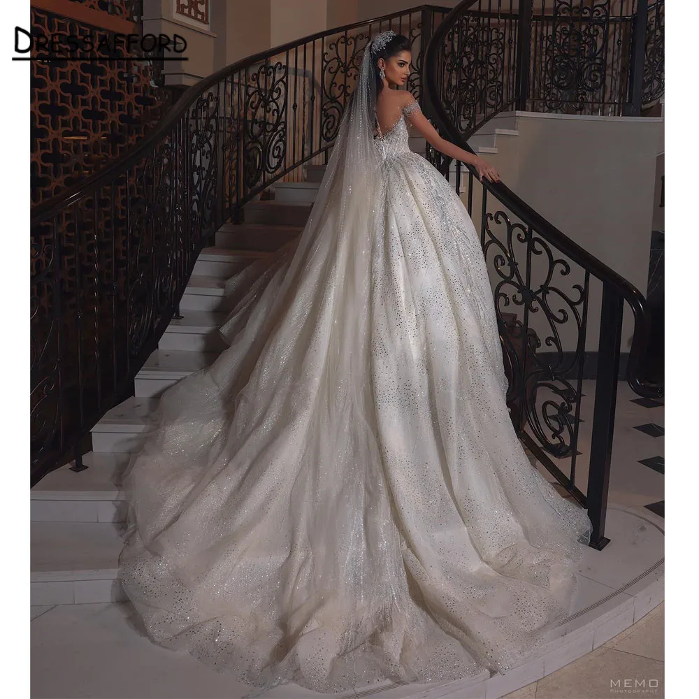 

Блестящее свадебное платье с блестящими кристаллами и иллюзией, свадебное платье Дубая, бальное платье с блестками и аппликациями, кружевное свадебное платье в стиле Саудовской Аравии