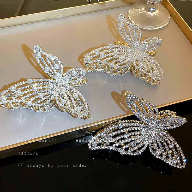 

Dongdaemun Temperament: Diamond Inlaid Pearl Butterfly Hollow Out Grip Clip Ins Design Sense; Back Head Curling Shark Hair