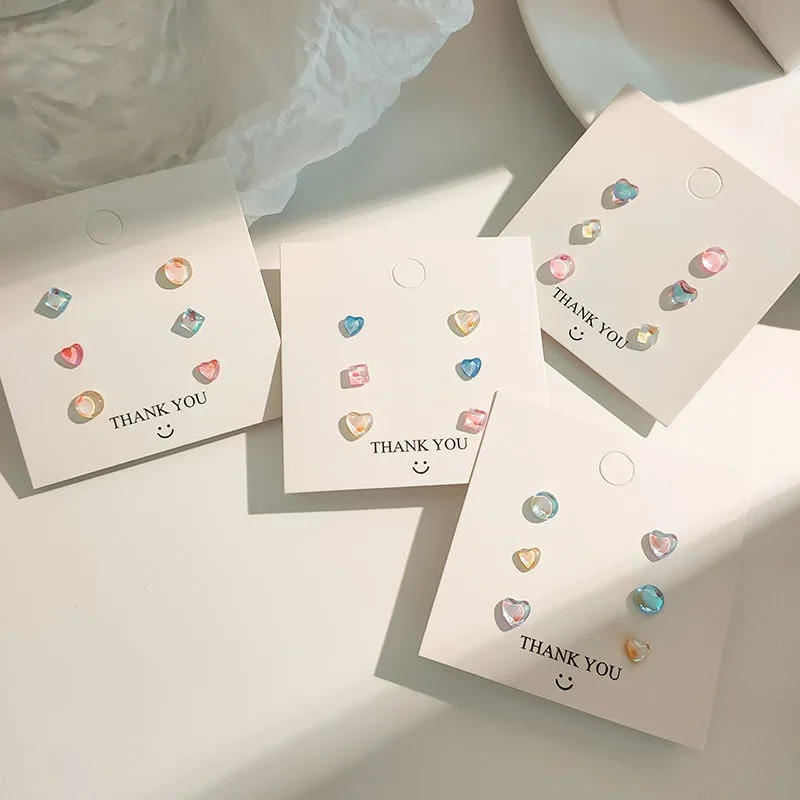 Набор разноцветных прозрачных круглых сережек-гвоздиков в форме сердца KADRUFI