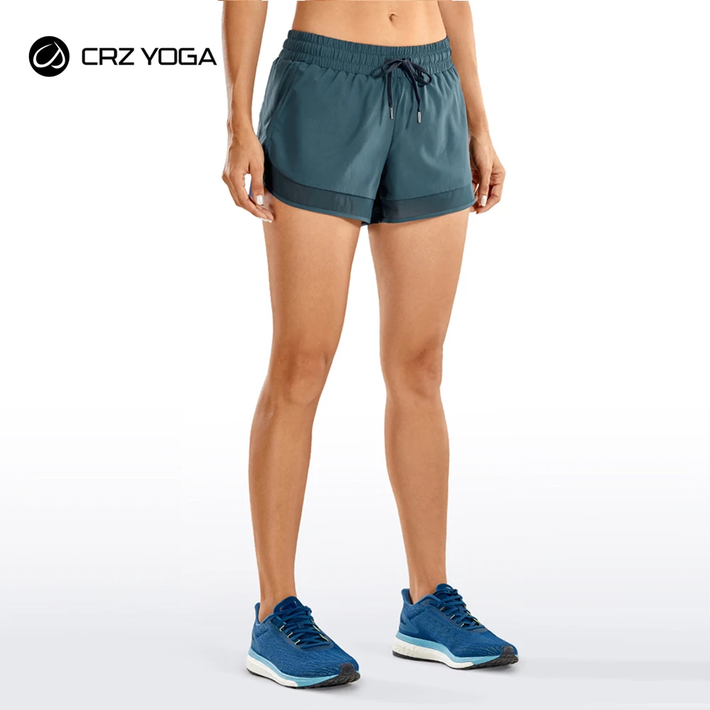 

CRZ YOGA Women's Quick Dry Workout Running Shorts Loose Drawstring Athletic Gym Shorts with Zip Pocket -3 Inches