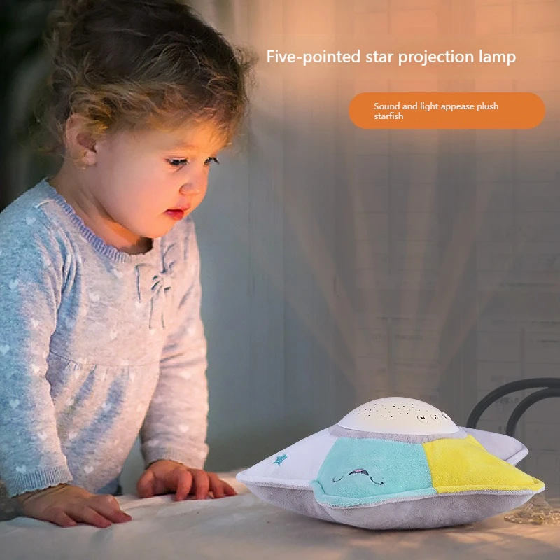 

Hot selling baby sleeping five pointed star projection lamp star sky Baby Soothing luminous music plush toy