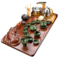 complete set of purple sand tea set household tea drinking automatic kettle integrated solid wood tea tray tea table tea