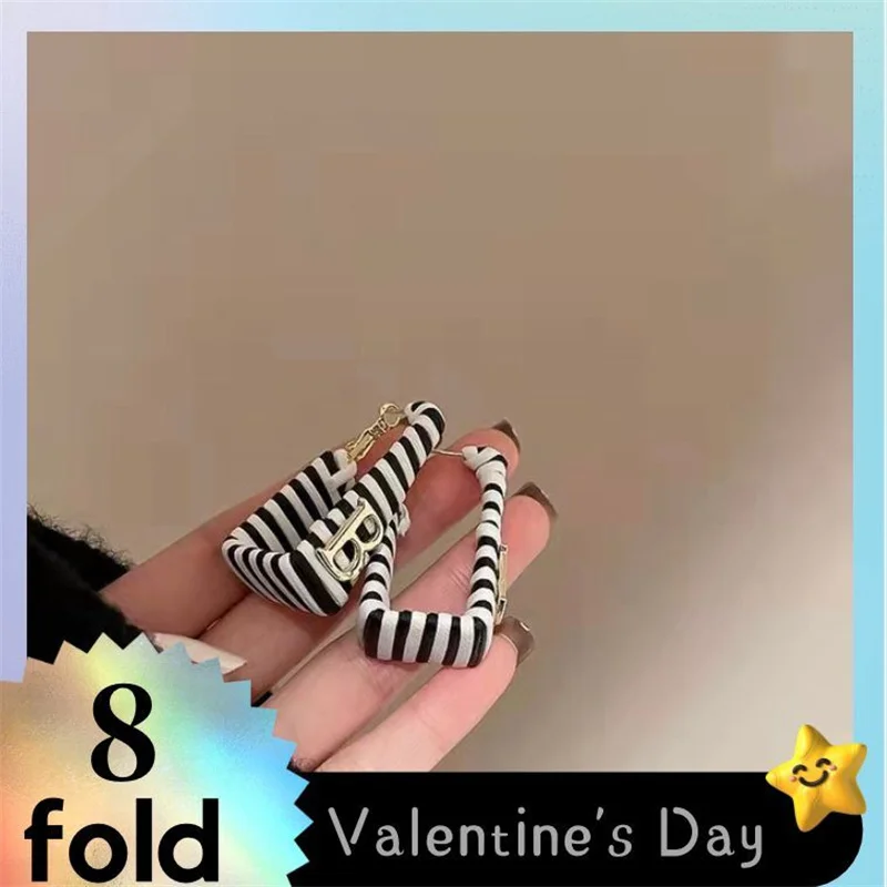 

Retro High Sense of Fashion Temperament Zebra Stripes Black And White Letters 925 Silver Needle Net Red Earrings