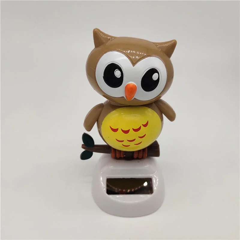 

Free Shipping Auto Dashboard Solar Powered Cute Owl Birds Shaking Head Car Ornament Solar Toys Classic Doll Car Accessories Toys