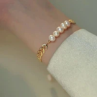 creative design sense leaf shape golden chain pearl stainless steel charm bracelet fashion luxury jewelry for womans accessories