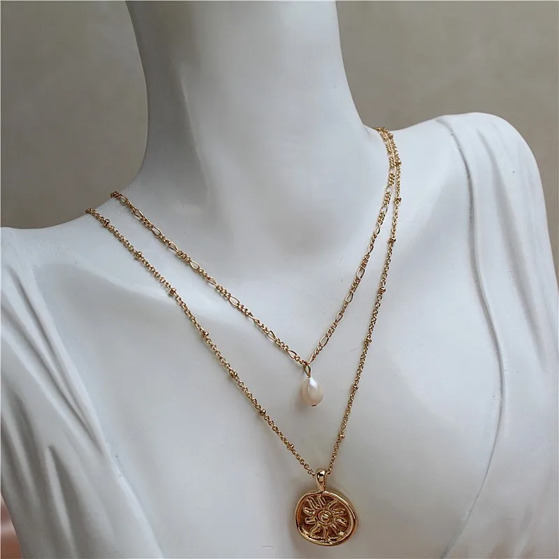 Купи New one card two can be separated wear collarbone chain golden sun totem water drop shaped culture pearl female necklace за 179 рублей в магазине AliExpress