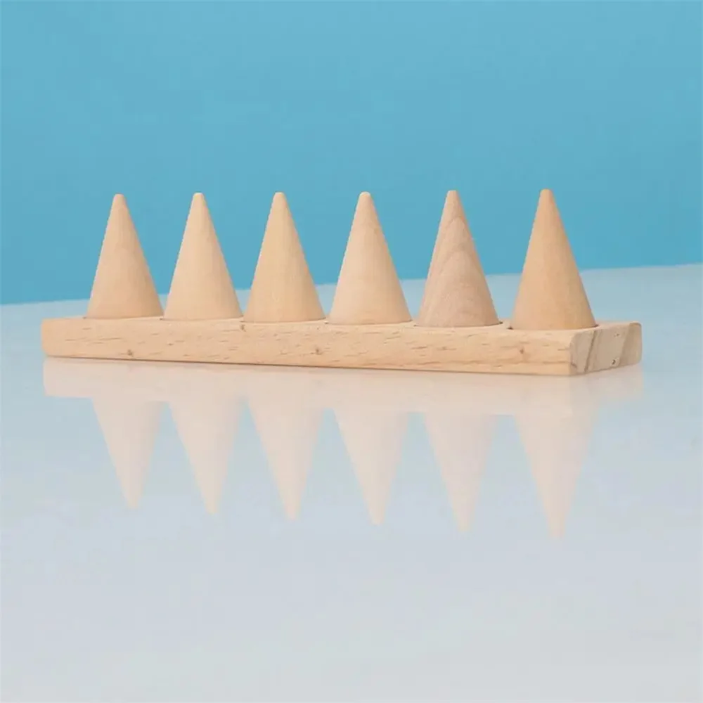 

Деревянная подставка для колец