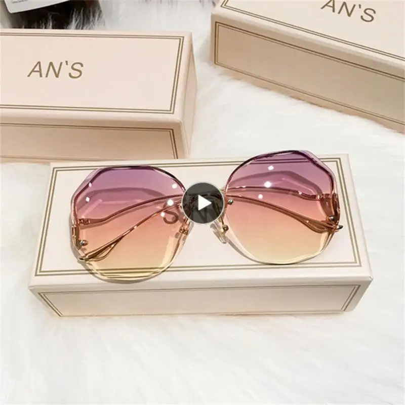 

2022 Fashion Brown Gradient Sunglasses Women's Frameless Cut Edge Multi-Deformable Metal Curved Temple Sunglasses
