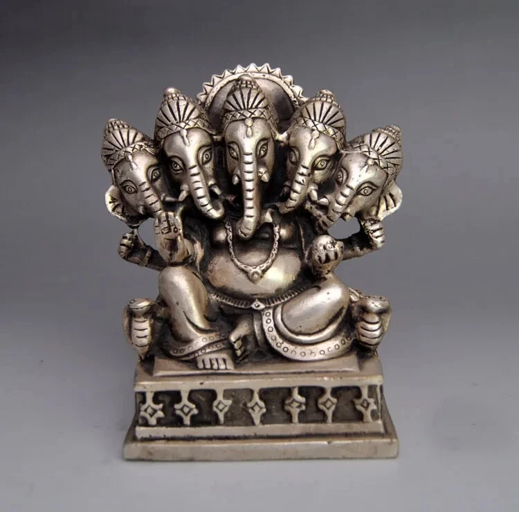 

Collectible Decorated Old Handwork Tibet Silver Carved Trunk Buddha Statue