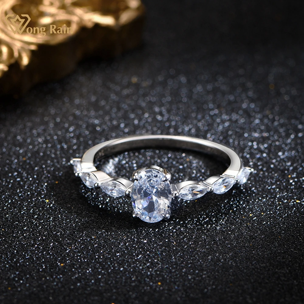 

Wong Rain Solid кольцо из стерлингового серебра 925 пробы с овальным белым сапфиром Moissanite, свадебное коктейльное кольцо, хорошее ювелирное изделие, ...