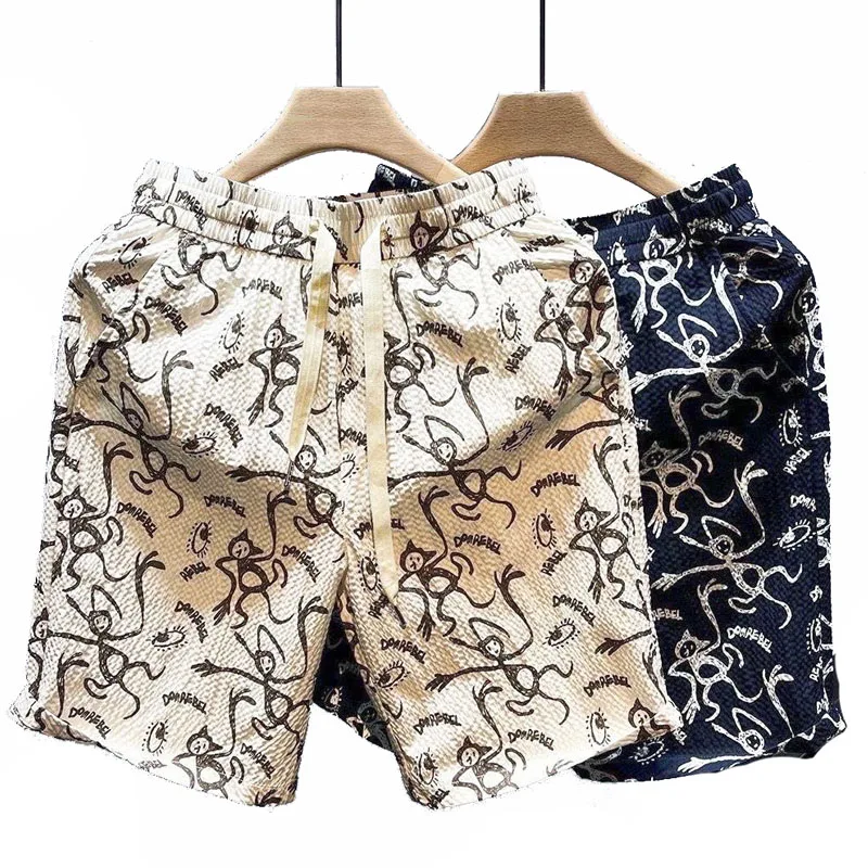 

Graffiti printed ice silk men's shorts 2023 new hot color beach pants men's fifth pants couple sports pants