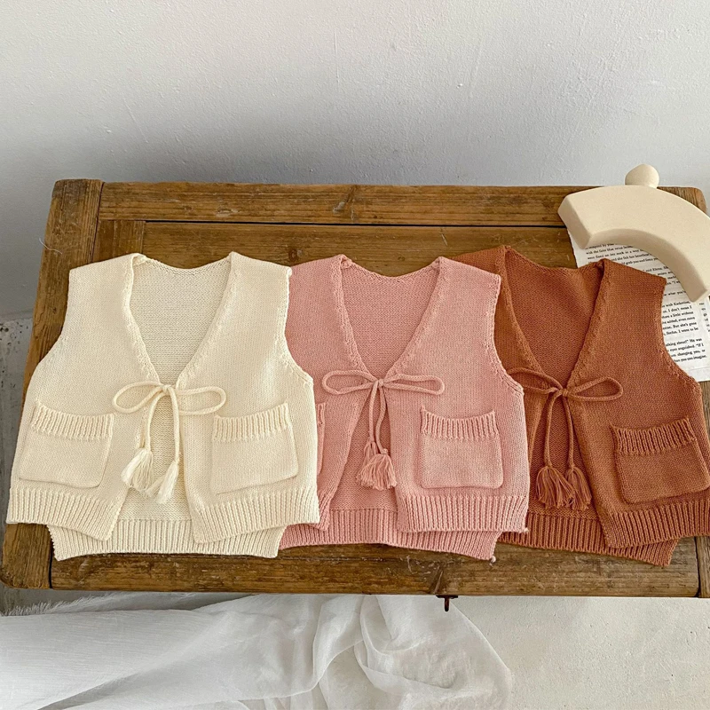

Baby Girls Knitted Vest Spring Autumn New Solid Color V-Neck Lace Up Waistcoat 2022 Fashion All-Match Sleeveless Children's Tops
