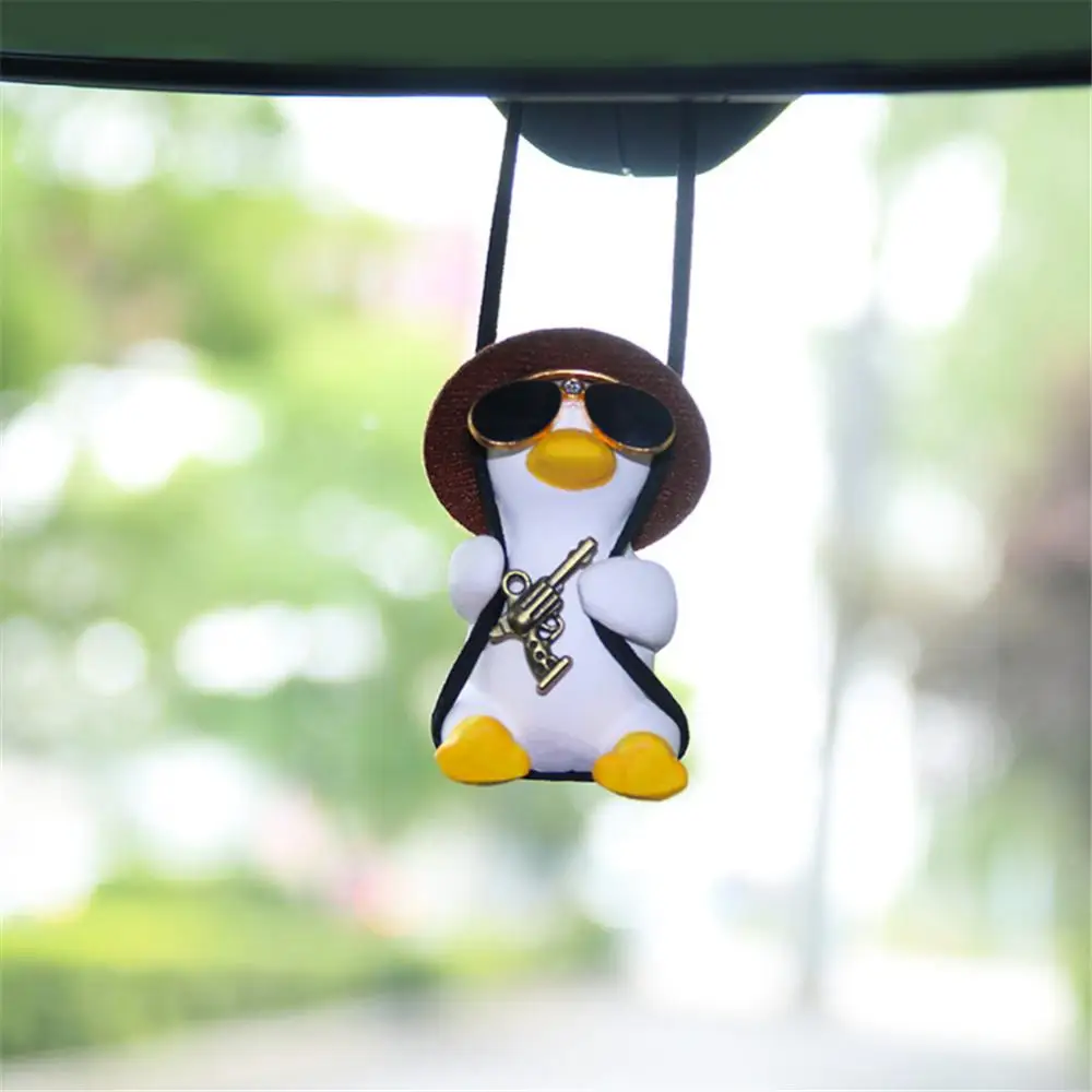 

Anime Duck Gypsum Duck Pendants Newest Super Cool Revolver Car Pendant Cute Gypsum Auto Rearview Mirror Pendant Swing Duck Hot