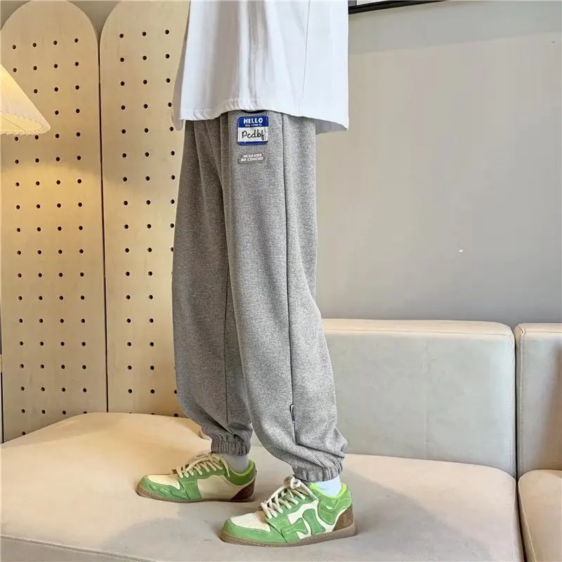 

Sports pants men's spring and autumn models 2022 new loose-fitting feet chic Hong Kong-flavored pants high street ins sweatpants
