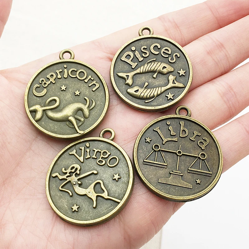 

Assorted Antiqued bronze Zodiac charms twelve constellations Metal sign pendant wholesale Jewelry Making Accessories