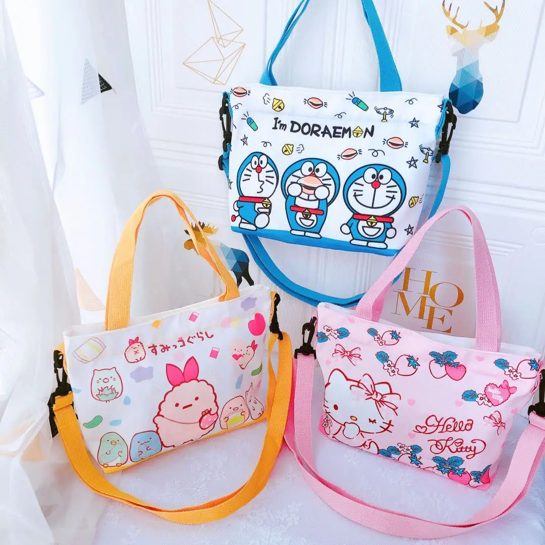 

Sanrio Canvas Crossbody Bags Hello Kitty Backpack Kuromi Pudding Dog My Melody Printed Kawaii Shoulder Bags Hand Bag Girl Bags