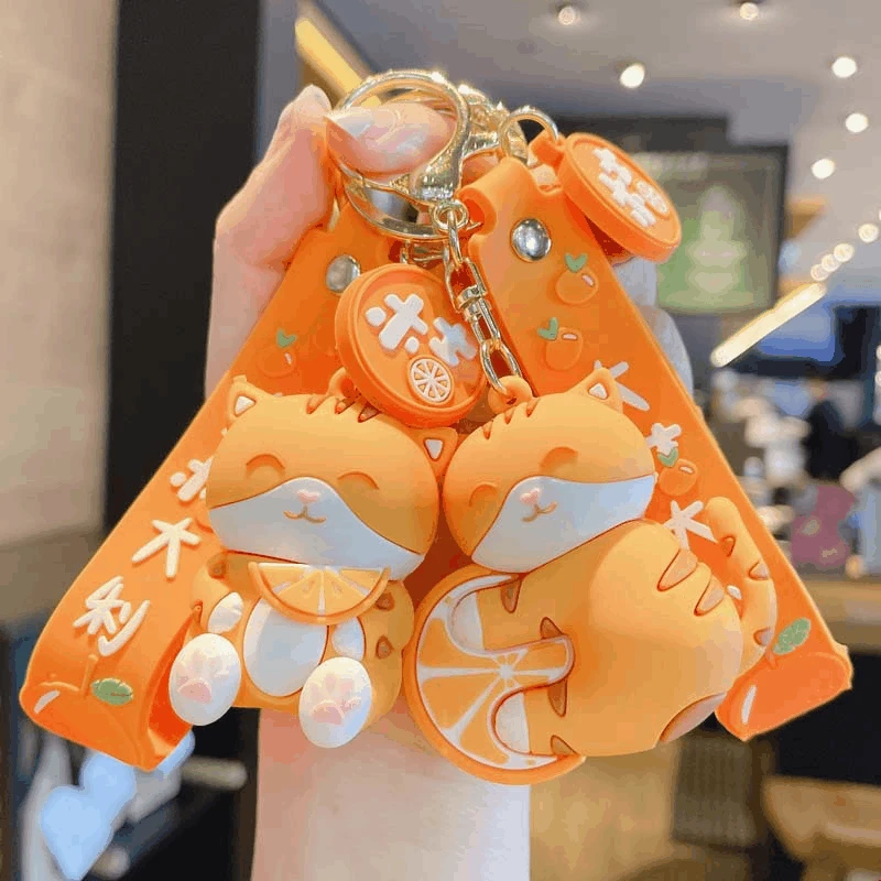 

Cartoon Cat Orange Action Figure Keychain Cute Bag Key Chain Pendant Creative Couple Girl Gift Keyring Jewelry Woman Fashion