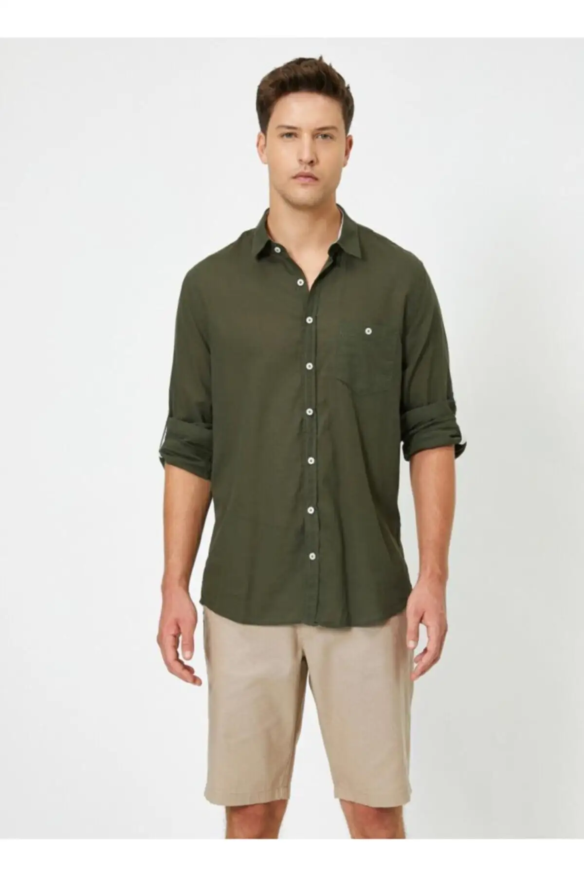 

Спортивная рубашка с длинным рукавом и одним карманом