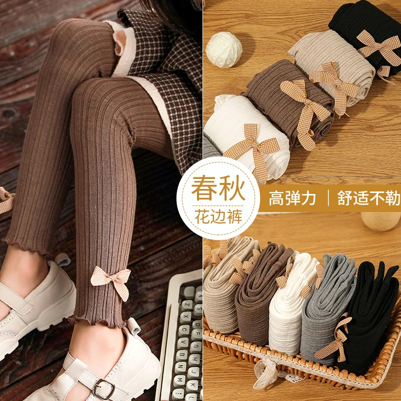 

Spring and Autumn Girls Japanese style wide strip solid color plaid cute bow fungus edge nine-point pants