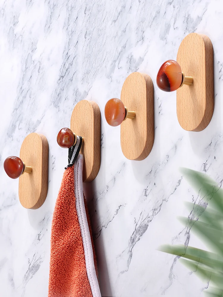 

with no punching hooks, key storage on the wall at the entrance, wooden clothes hook, wall hanging