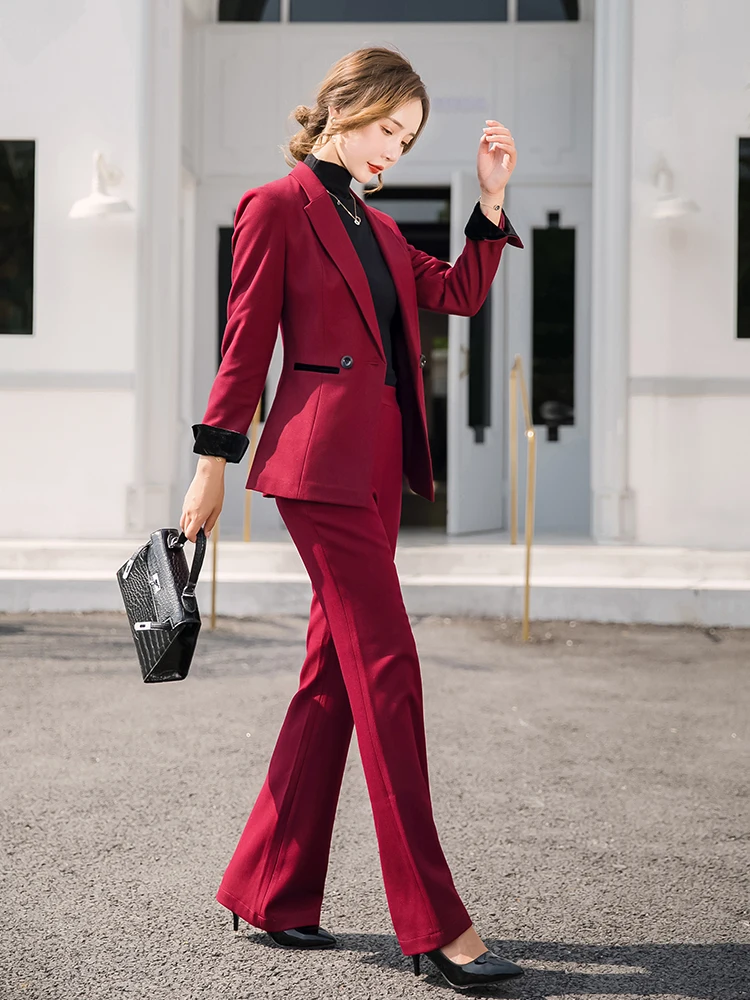 In the autumn of 2022, the new two-piece women's suit is wine red, with two buttons, long sleeves, slim fit and high-grade bell