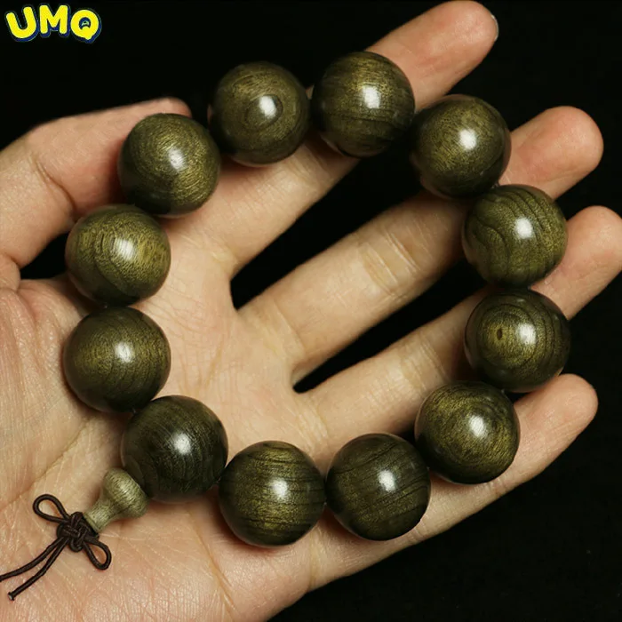 

Black Silk String Green Buddha Eye Chain 2.0