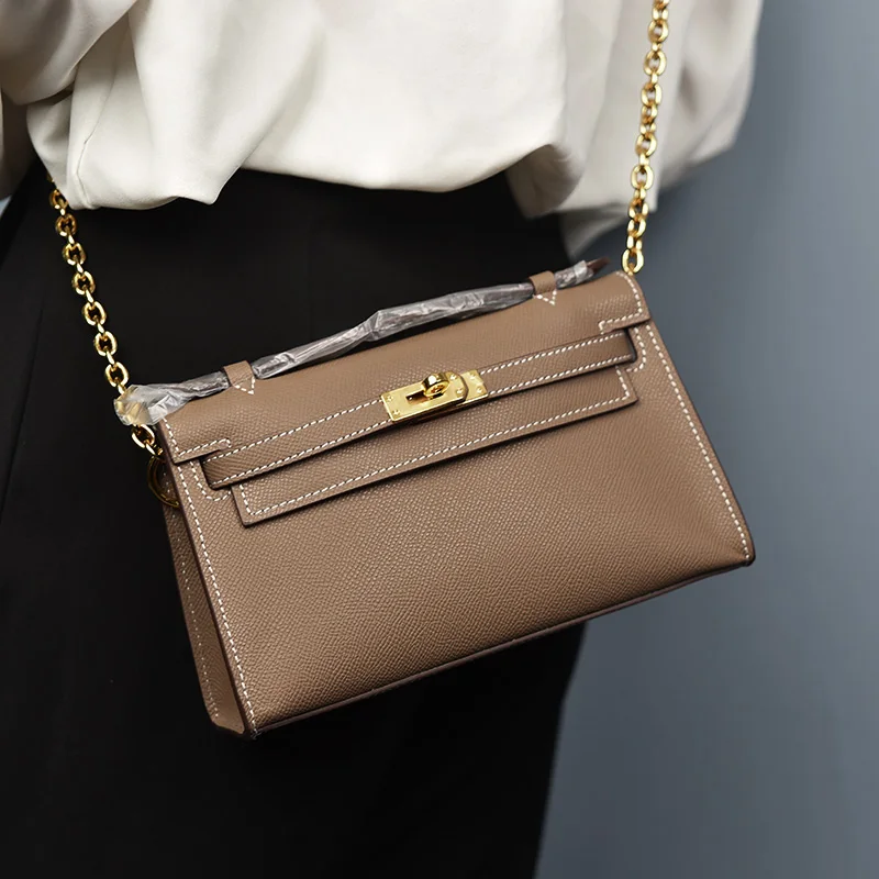 

Модные женские маленькие вечерние сумочки, из воловьей кожи на ремне, однотонные слинги, дизайнерский женский праздничный чемоданчик с мет...