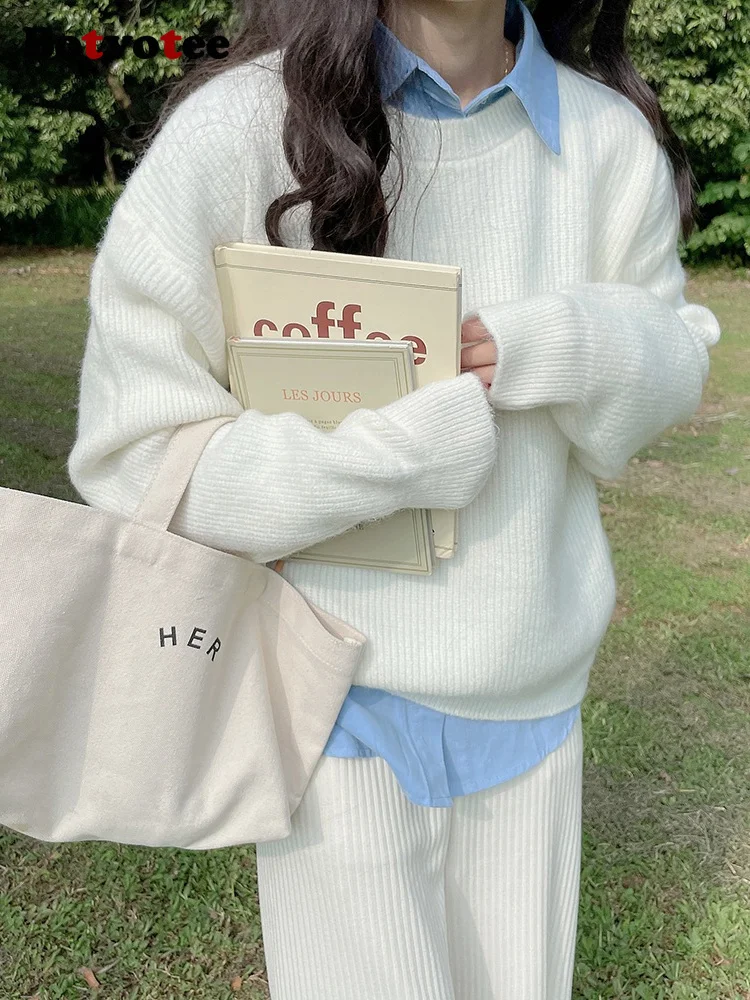 Женский свитер свободного покроя с длинным рукавом и круглым вырезом |