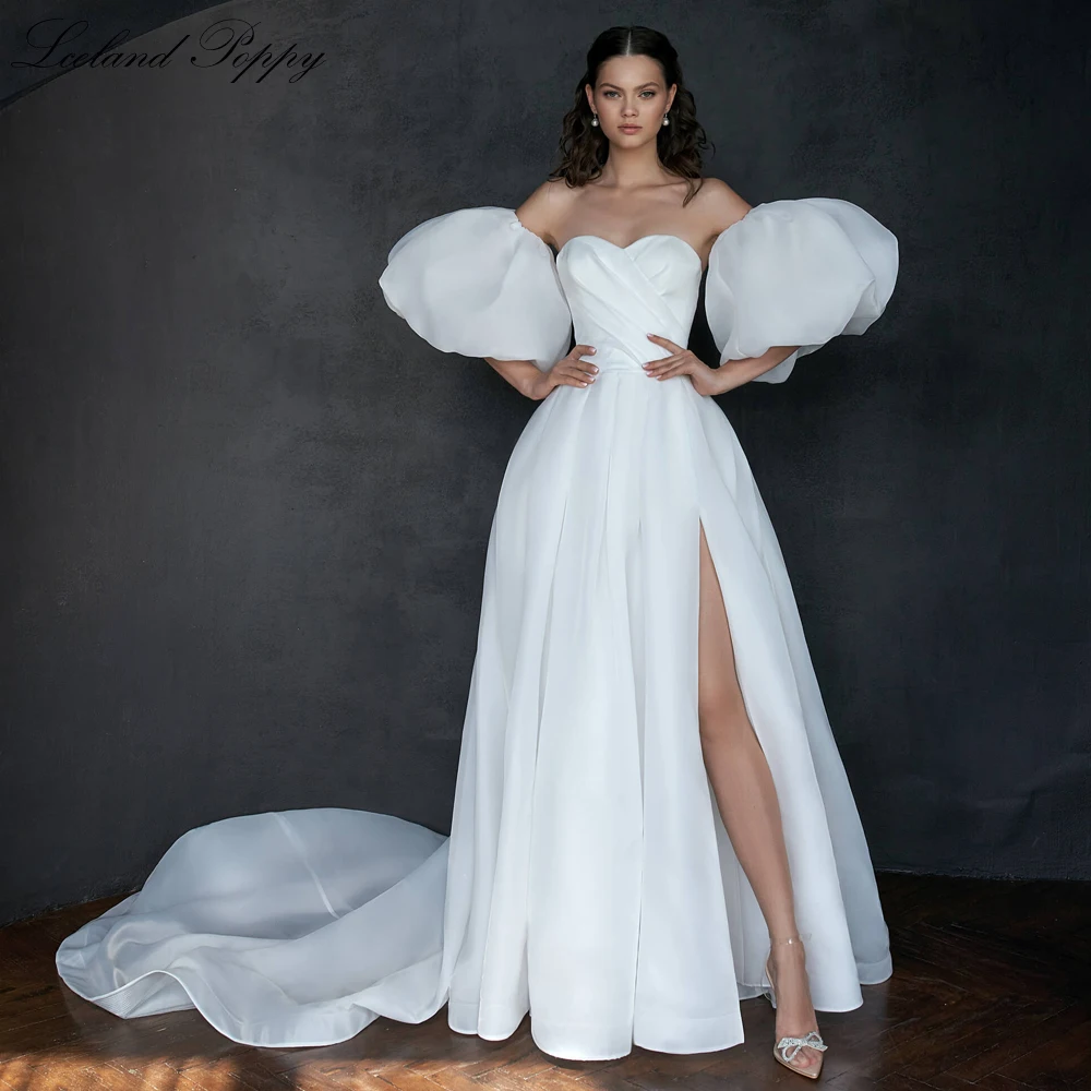 

Lceland Poppy Elegant A Line Strapless Organza Wedding Dresses Puff Sleeves Floor Length Pleated Bridal Gowns with High Slit