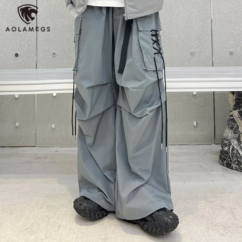 

Хип-хоп мужские патч C лентой с перекрестными кружевными карманами плиссированные спортивные брюки оверсайз прямые брюки с эластичной резинкой на талии хит цвет пояс для мужчин и женщин