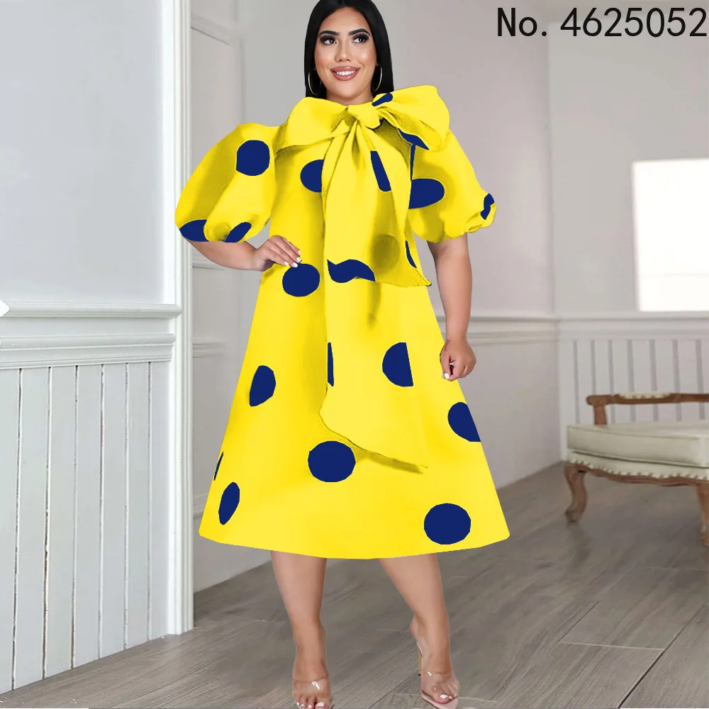 

Платье-миди женское ТРАПЕЦИЕВИДНОЕ с пышными рукавами и большим бантом