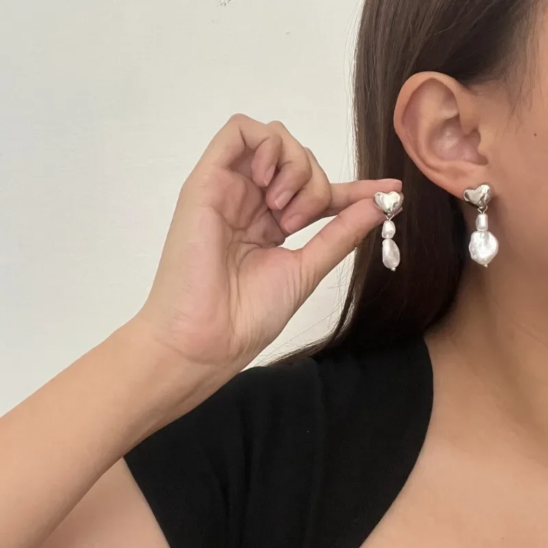 Женские серьги-подвески с жемчугом