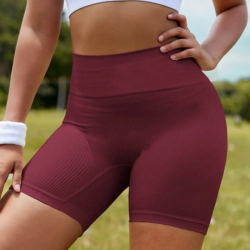Yoga shorts female summer wear quick-drying anti-curling sports shorts peach hip fitness shorts.