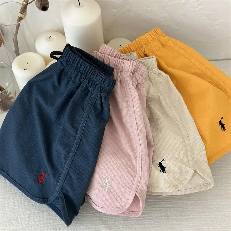

Children's shorts 2023 summer new style boys and girls' casual sports shorts baby solid Beachwear