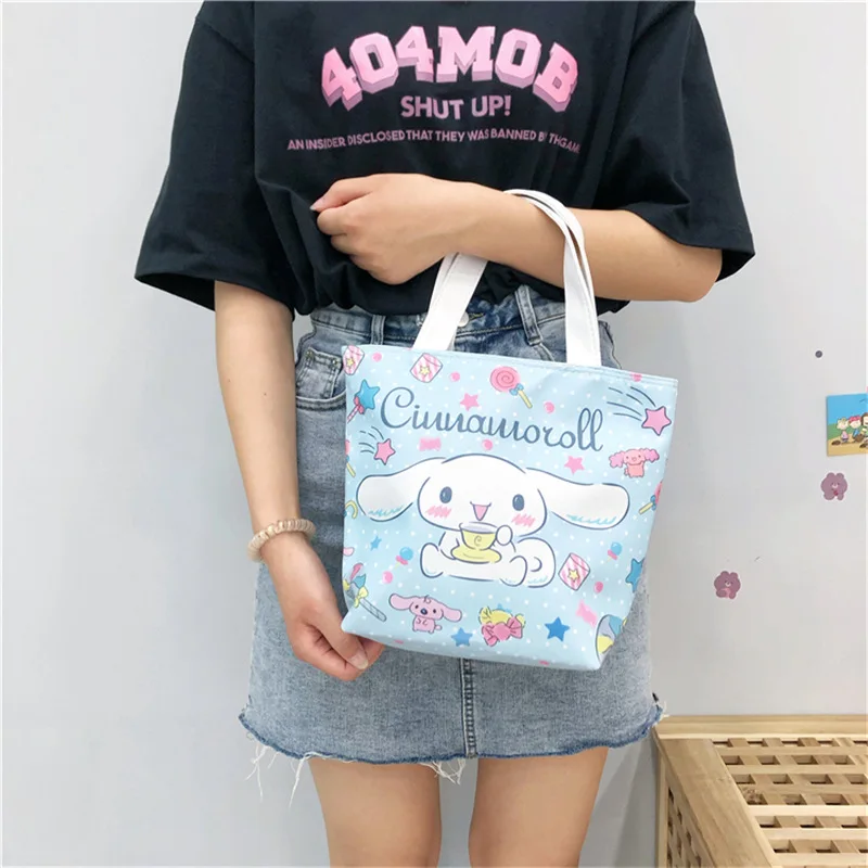 

Sanrio Bag New Japanese Hello Kitty Kuromi Melody Cute Cartoon Canvas Portable Lunch Bag Rice Hand Lunch Portable Handbag