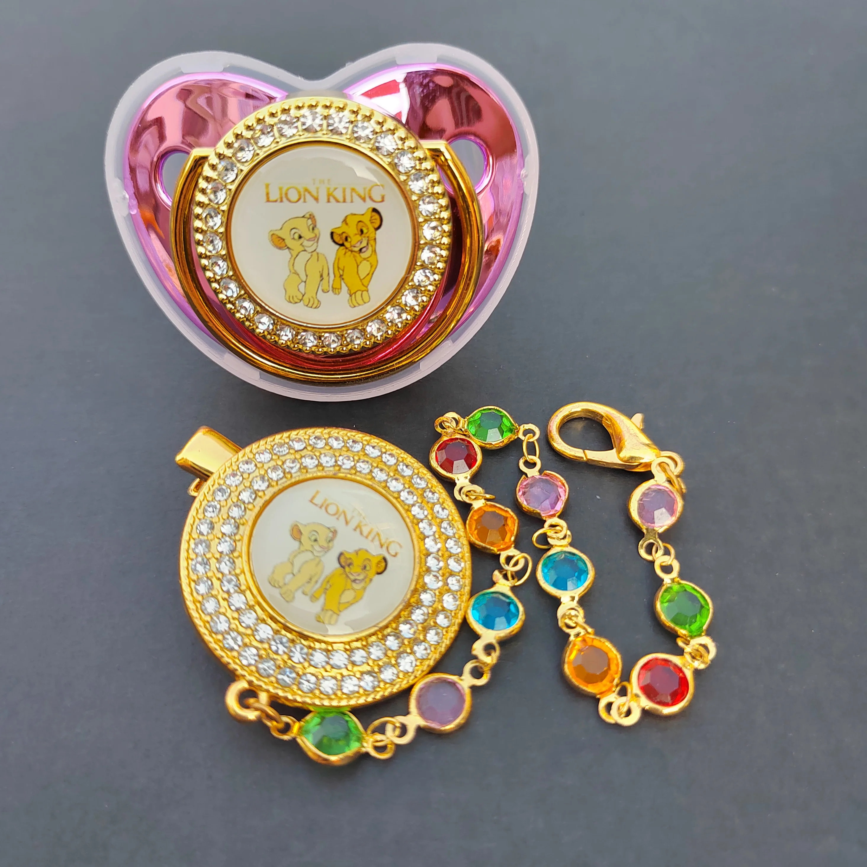 

Disney sells new baby pacifier clip string of pearls Cartoon animal rhinestone pacifier holder silicone pacifier baby pacifier