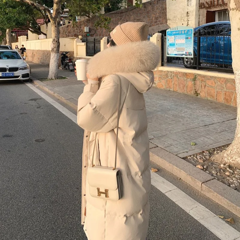 New Hooded Down Jacket White Duck Down Fox Fur Collar Warm Cotton Jacket Women In The Long Section Design Sense Sweet Jacket