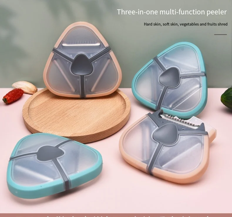 

New three-in-one peeler multi-function peeling knife creative melon and fruit planer kitchen gadget grater